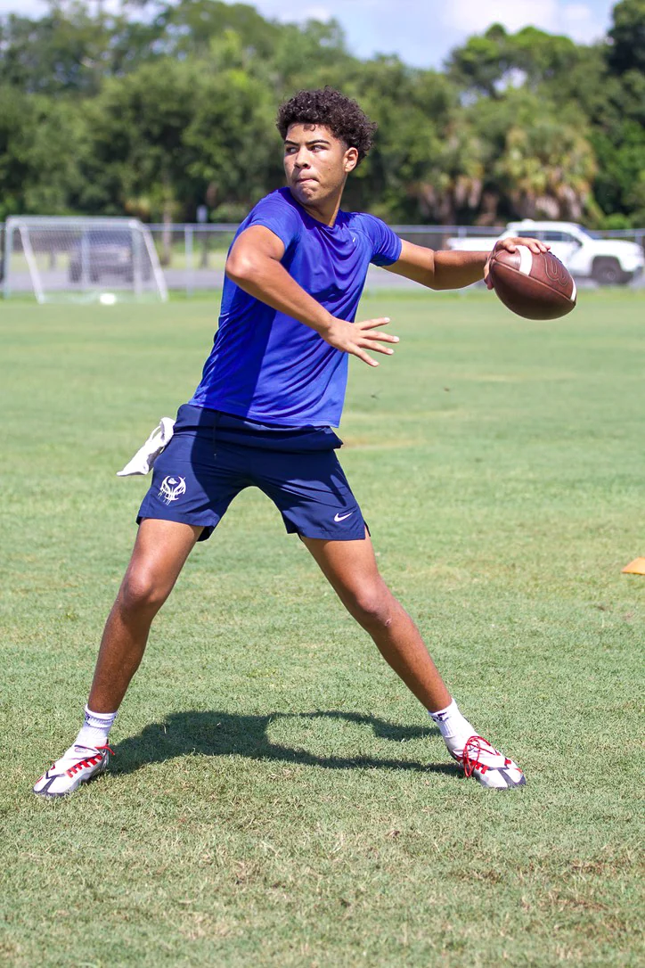 Quarterback in a throwing stance